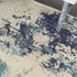 2' X 4' Ivory And Teal Blue Abstract Power Loom Non Skid Area Rug